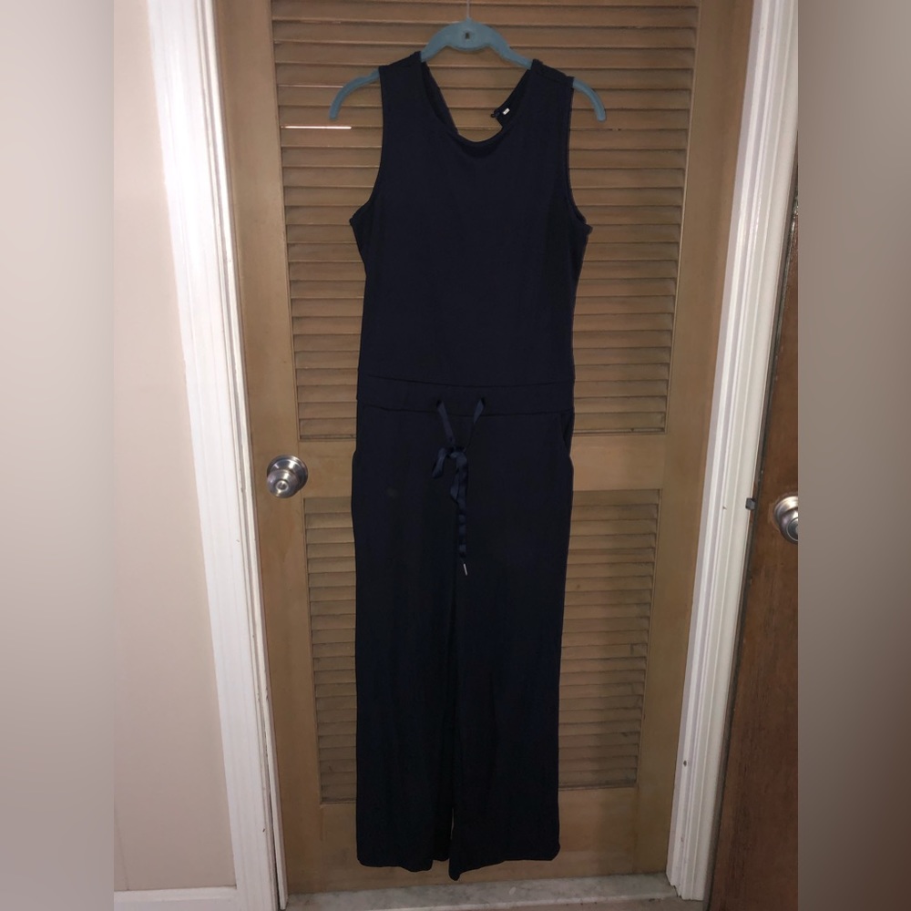 Brand new never worn women’s sleeveless wide legs jumpier. Navy blue